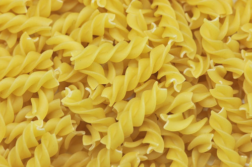 The image shows a pile of Fusilli pasta