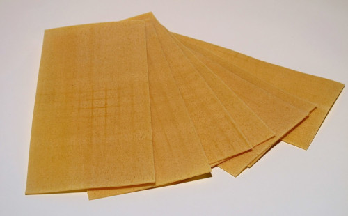 The image shows several sheets of Lasagna