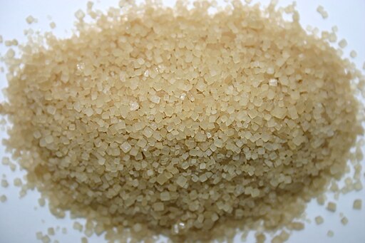 The Raw sugar on the white background