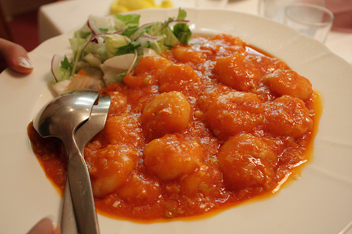 The picture shows a dish of Shrimp Chili
