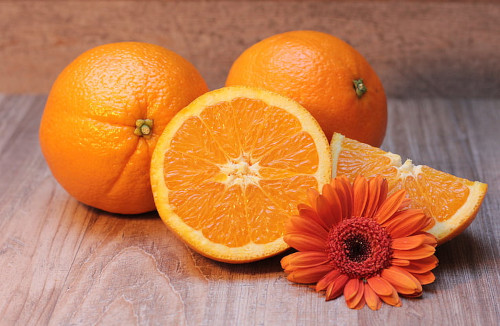 The picture of vitamin-C-rich oranges and a flower