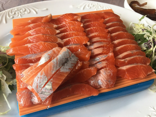 The picture depicts a pile of chopped salmon.